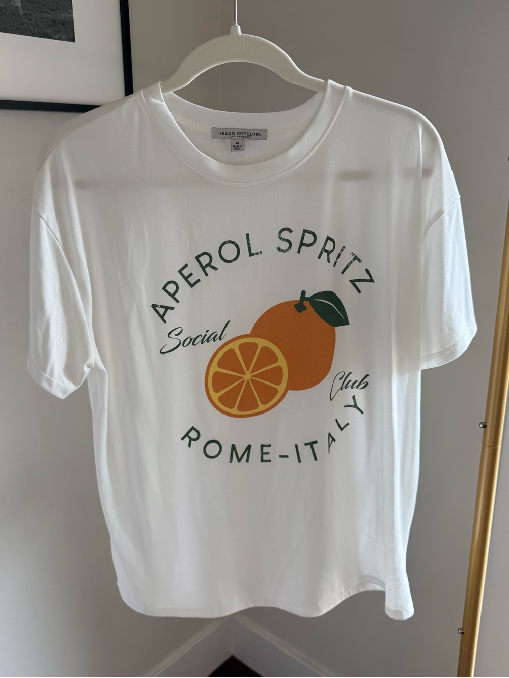Green Envelope White Tee with Orange Fruit Graphic